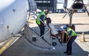 wheelchair passenger boarding plane